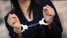 Woman in handcuffs