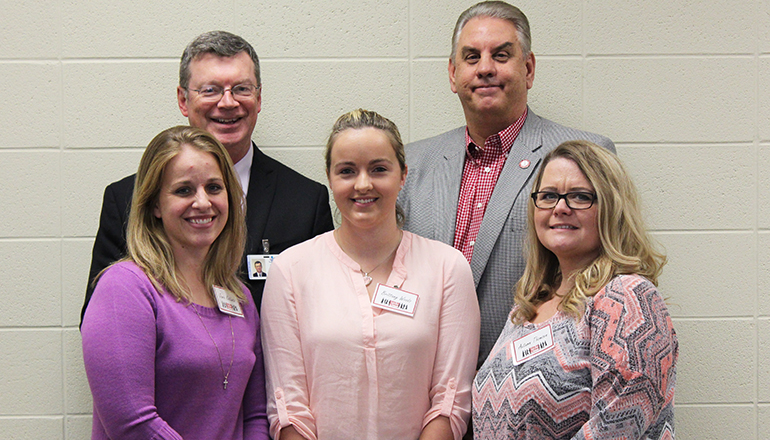 Pictured from left, back row: Jeff Crowley, Executive Director of Serve Link Home Care and Dr. Lenny Klaver, President of NCMC. Front row: Jame Kottowitz, Brittany Woods and Autumn Thomsen.