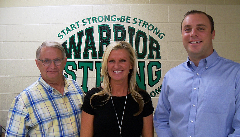 Dr. Tracy Platt, Smithville High School Principal flanked by Zane Myers on the right and Steve Maxey, Community Foundation Marketing Director on the left.