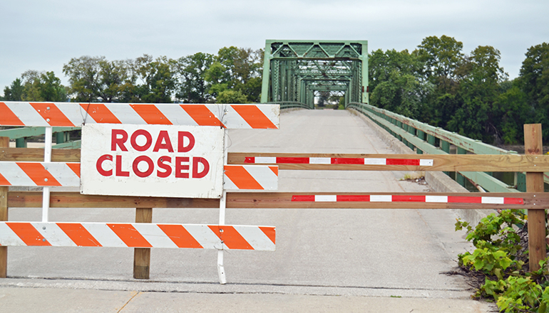 Road Closed leading to bridge