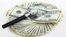 Money and Magnifying glass