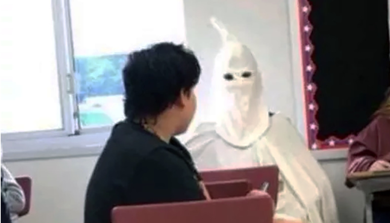 Student dressed as Klansman