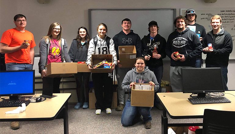 NCMC students in Missie Cotton’s Microcomputer Applications classes recently donated non-perishable items to the Grundy County Food Pantry, or other local food pantries. Pictured is Mrs. Cotton’s class with their items.