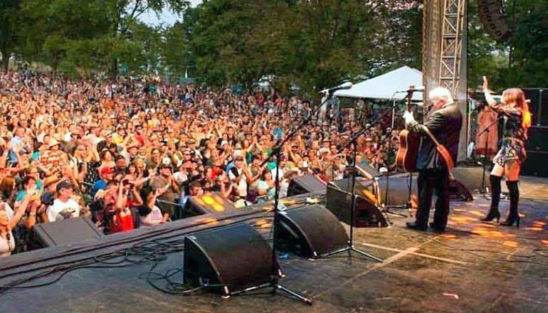 John Pine surveys the crowd after performing at Roots-N-Blues Festival