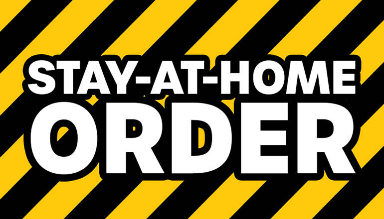 Stay At Home Order with black and yellow caution stripes