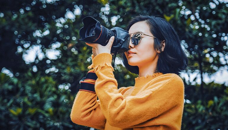 Woman Taking Photos