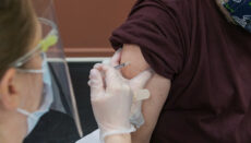 Person getting injection (COVID-19)
