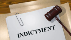 Indictment graphic with gavel and file folder