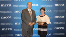 Micha Rounkles representing Sonoco Plastics with NCMC President, Dr. Lenny Klaver