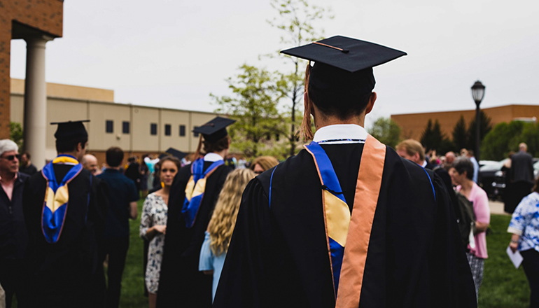 College Graduation or Graduate also education (Photo by Charles DeLoye on Unsplash)