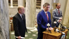 State Sen. Bill Eigel, R-Weldon Spring, speaks Thursday at a news conference as other members of the conservative caucus, Sens. Denny Hoskins, R-Warrensburg, left, and Bob Onder, R-Lake St. Louis, listen (Photo by Rudi Keller - Missouri Independent)