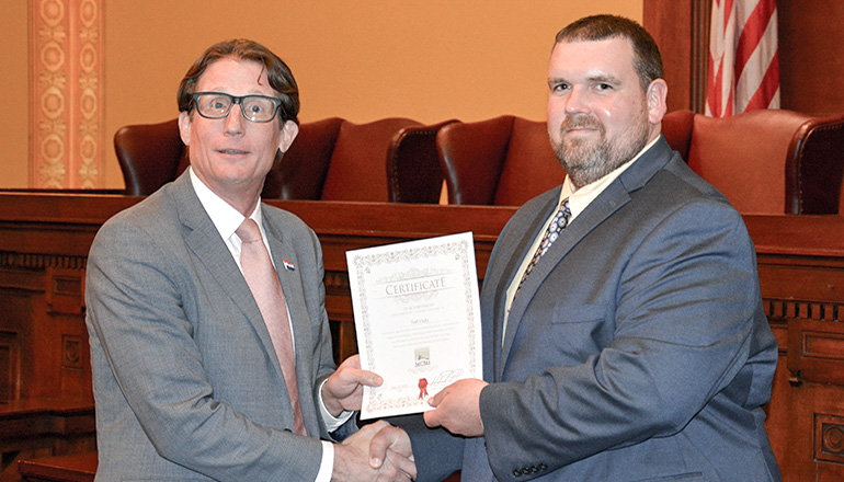 Missouri Supreme Court Judge, the Honorable Brent Powell (left) and Seth Oaks (right).