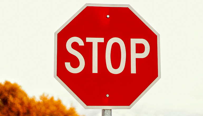 Stop Sign (Photo by Joshua Hoehne on Unsplash)