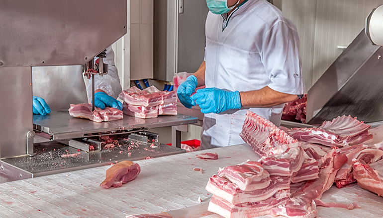 Worker in meat packing plant (Photo courtesy Missouri News Service)