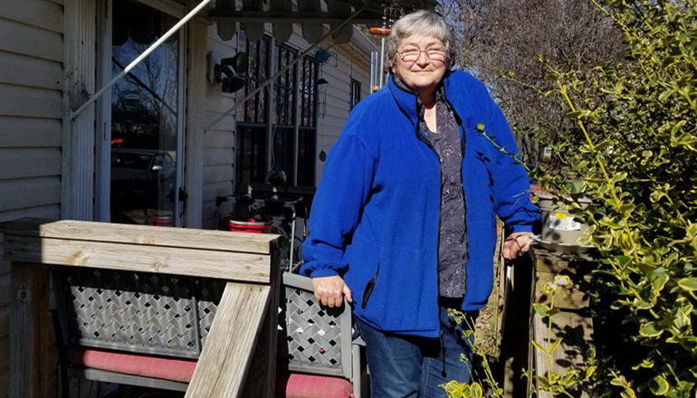 Rebecca Varney on the porch of her home in Edgar Springs (Photo courtesy Rudi Keller - Missouri Independent)