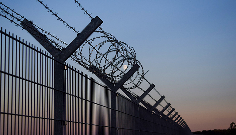 Border fence at US-Mexico border (Photo by Jannik on Unsplash)