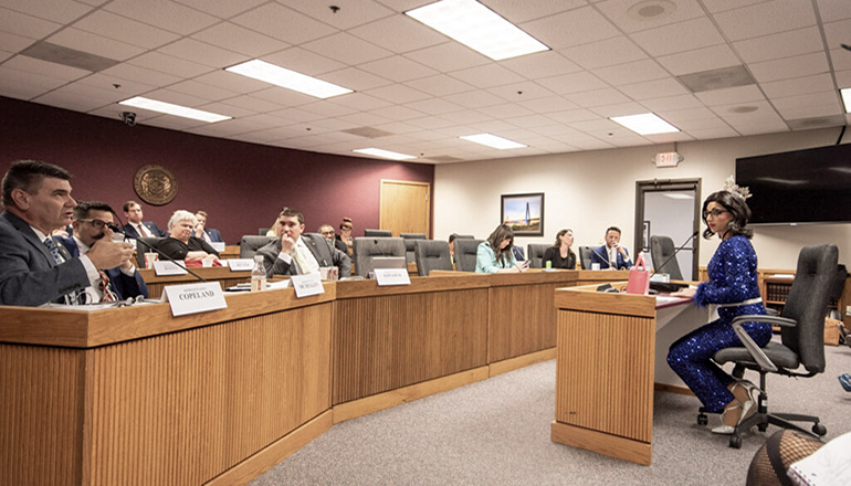 David Hall, who performs as drag queen Kaycee Adams, answers a question from Rep. Ron Copeland (Photo by Annelise Hanshaw - Missouri Independent)