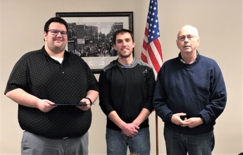 Drew Smith, left, and John Anthony, right, received Paul Harris Fellow recognition at the Trenton Rotary Club meeting