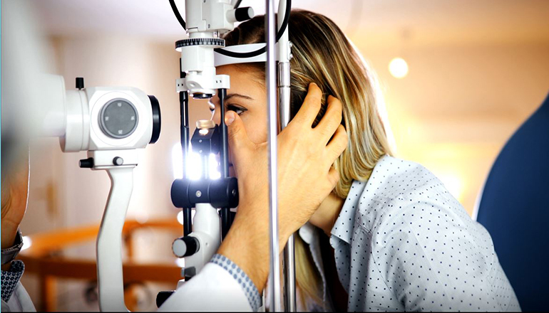 Patient receiving eye exam (Photo licensed via Envato Elements)