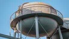 Water Tower (Photo by Alex Quezada on Unsplash)