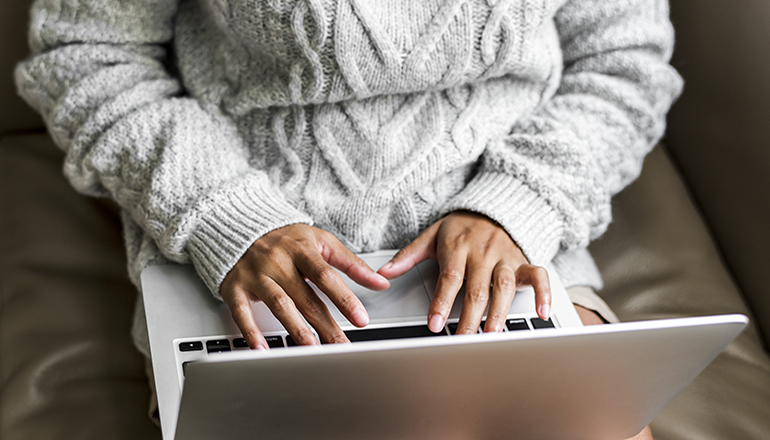 Woman working on a laptop computer