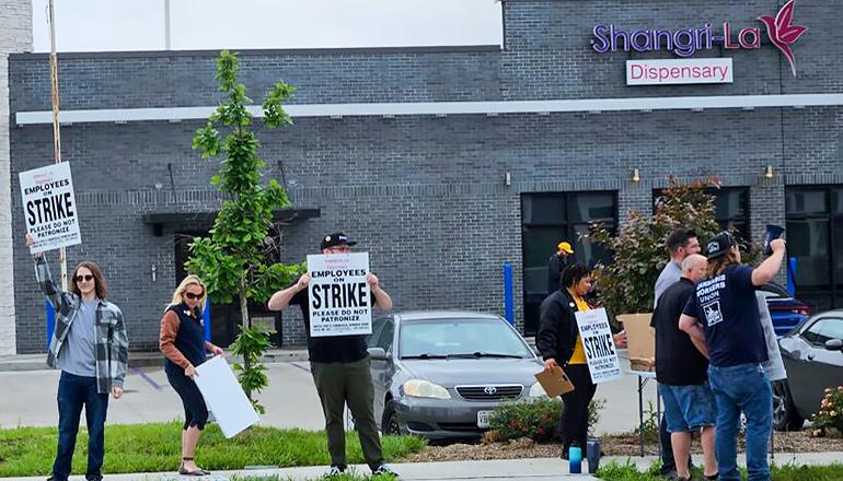 The Shangri La South dispensary in Columbia is picketed Tuesday outside the store (Photo by Rudi Keller - Missouri Independent).
