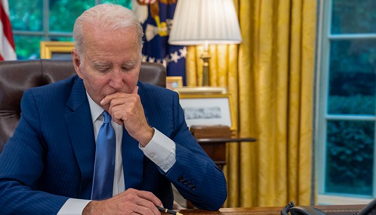 President Joe Biden talks on the phone with Canadian Prime Minister Justin Trudeau (Official White House photo by Adam Schultz)