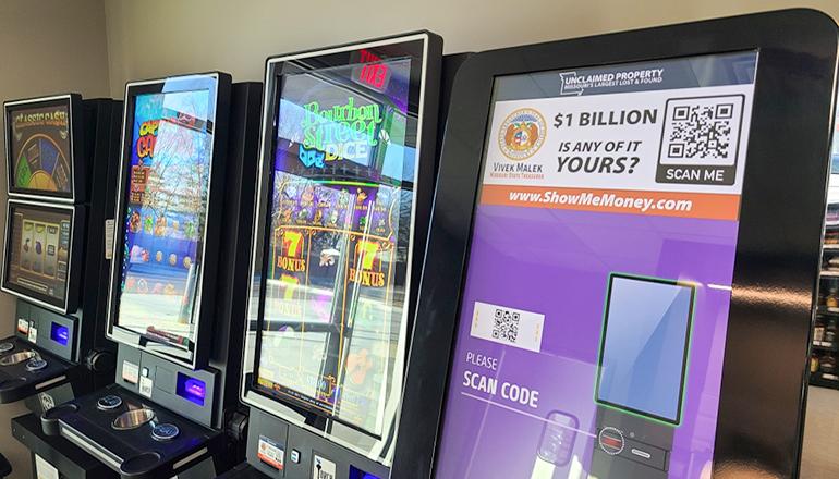 Torch Electronics games and a redemption kiosk displaying advertisements for the Unclaimed Property Program operated by State Treasurer Vivek Malek (photo submitted).