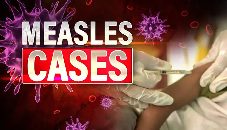 Measles cases climb as holiday travel season begins